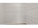 Functional closet with white wire shelving for optimized storage solutions at 1745 Ripley Woods St, Wake Forest, NC 27587