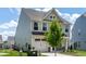 View of home's side and front highlighting siding, garage, and landscaping details at 1745 Ripley Woods St, Wake Forest, NC 27587