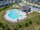 Aerial view of a neighborhood pool showcasing the pool's size and surrounding amenities at 1745 Ripley Woods St, Wake Forest, NC 27587