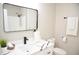 Bathroom featuring a marble countertop and modern black fixtures at 1815 Chandellay Dr, Durham, NC 27705