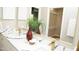 Bathroom featuring a marble countertop, double vanity, and modern gold fixtures at 1815 Chandellay Dr, Durham, NC 27705