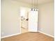 Inviting dining room featuring hardwood floors and contemporary pendant lighting at 1815 Chandellay Dr, Durham, NC 27705