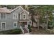 Charming two-story home featuring a covered front porch with a landscaped front yard at 1815 Crystal Downs Lane, Raleigh, NC 27604