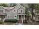 Charming home with a covered porch, brick steps, and beautiful landscaping at 1815 Crystal Downs Lane, Raleigh, NC 27604