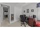 Comfortable office space with desk and chair near closet and open doorway at 1815 Crystal Downs Lane, Raleigh, NC 27604