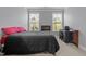 Bright bedroom with two windows and a view of the playground at 184 Elgin Ct, Burlington, NC 27215