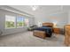 Spacious main bedroom featuring trey ceiling and large windows at 184 Elgin Ct, Burlington, NC 27215