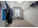 Bright walk-in closet with window and built-in shelving provides ample storage at 184 Elgin Ct, Burlington, NC 27215