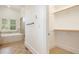 Bathroom with tub, glass shower, and walk in closet at 20002 Fountain, Chapel Hill, NC 27517