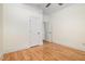 Spacious bedroom with hardwood floors, white trim and neutral paint at 20002 Fountain, Chapel Hill, NC 27517