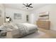 Inviting bedroom with ceiling fan, art and neutral colored decor at 20002 Fountain, Chapel Hill, NC 27517