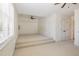 This bonus room features neutral carpet, crown molding, and a ceiling fan at 20002 Fountain, Chapel Hill, NC 27517