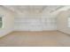 Bonus room featuring custom built-in shelving and ample storage at 20002 Fountain, Chapel Hill, NC 27517