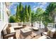 Beautiful furnished deck with an outdoor seating area and a fire pit feature at 20002 Fountain, Chapel Hill, NC 27517