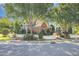 Beautiful corner lot home with mature trees and a white picket fence at 20002 Fountain, Chapel Hill, NC 27517