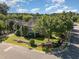 Charming home featuring manicured lawn, a picket fence, mature trees, and beautiful landscaping at 20002 Fountain, Chapel Hill, NC 27517