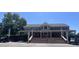 Beautiful brick home with a large covered porch and grand staircase at 2053 Thornblade Dr, Raleigh, NC 27604