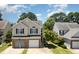 Charming two-story home featuring a two-car garage and beautifully designed architectural features at 2053 Thornblade Dr, Raleigh, NC 27604