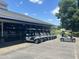 Row of golf carts neatly parked outside, ready for a day on the course at 2053 Thornblade Dr, Raleigh, NC 27604