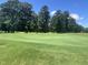 Scenic view of the well-maintained golf course at 2053 Thornblade Dr, Raleigh, NC 27604
