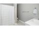 Bathroom with white shower curtain, toilet, and vanity at 2112 Dunn Rd, Raleigh, NC 27614