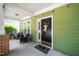 Inviting front porch with stylish accents and ample space for seating at 2112 Dunn Rd, Raleigh, NC 27614
