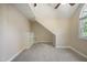 Neutral bedroom featuring carpet and ample storage at 217 Dalmeny Dr, Cary, NC 27513