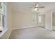 Spacious bedroom with large mirrored closet doors and natural light at 217 Dalmeny Dr, Cary, NC 27513