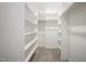 Well-organized closet with ample shelving providing plenty of room for storage and organization at 217 Dalmeny Dr, Cary, NC 27513