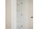 Walk-in closet with white shelving and ample storage space at 217 Dalmeny Dr, Cary, NC 27513