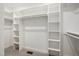 Spacious closet with ample storage, featuring built-in shelving to maximize organization and convenience at 217 Dalmeny Dr, Cary, NC 27513