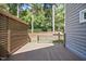 Wooden deck with stylish railings and privacy screen, perfect for relaxing and outdoor entertaining at 217 Dalmeny Dr, Cary, NC 27513