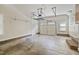 Spacious garage with high ceilings, lighting, ample space, storage and overhead garage door at 217 Dalmeny Dr, Cary, NC 27513