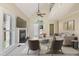 Bright living room with soaring ceilings, fireplace, and neutral decor at 217 Dalmeny Dr, Cary, NC 27513