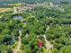 This aerial view captures a community near shopping and a hospital, offering convenient access at 221 Antique Lace Way, Holly Springs, NC 27540