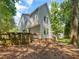 Wooded backyard featuring a privacy fence, offering seclusion and a natural setting at 221 Antique Lace Way, Holly Springs, NC 27540