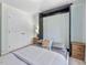 Bedroom featuring a Murphy bed and lots of closet storage at 221 Antique Lace Way, Holly Springs, NC 27540