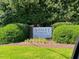 Somerset Farm sign, a beautiful community entrance surrounded by manicured landscaping at 221 Antique Lace Way, Holly Springs, NC 27540