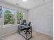Office featuring large windows, allowing natural light to illuminate the space at 221 Antique Lace Way, Holly Springs, NC 27540