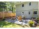 Cozy backyard featuring a patio with Adirondack chairs, perfect for relaxing outdoors at 2317 Bertie Dr, Raleigh, NC 27610