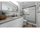 Updated bathroom features a sleek vanity and frameless glass shower at 2317 Bertie Dr, Raleigh, NC 27610