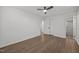 A bright and spacious bedroom with hardwood floors and neutral paint at 2317 Bertie Dr, Raleigh, NC 27610