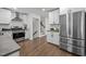 Updated kitchen boasts stainless steel appliances and ample countertop space at 2317 Bertie Dr, Raleigh, NC 27610
