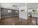 Spacious living room featuring hardwood floors, modern wall trim, and plenty of natural light at 2317 Bertie Dr, Raleigh, NC 27610