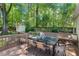 Outdoor dining on the home's beautiful backyard deck at 2504 State St, Durham, NC 27704