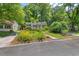 Lovely home with a well-maintained lawn and charming curb appeal in a peaceful neighborhood at 2504 State St, Durham, NC 27704