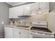Well-maintained kitchen with white appliances, ample counter space and cabinets at 2504 State St, Durham, NC 27704