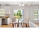 Cozy breakfast nook with sliding glass doors to the deck and backyard at 2644 Bloomsberry Ridge Dr, Fuquay Varina, NC 27526
