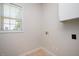 Clean laundry room with a large window at 2644 Bloomsberry Ridge Dr, Fuquay Varina, NC 27526