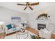 Charming living room with fireplace and comfortable seating at 2644 Bloomsberry Ridge Dr, Fuquay Varina, NC 27526